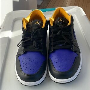 Jordan Black and Purple Sneakers with Classic Low-Top Design